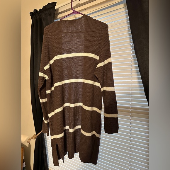 Sweater cardigan with pockets. Color is a purplish brown with white stripes. - Picture 2 of 3